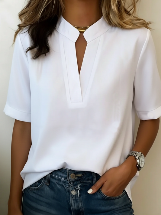 Blusa elegante con cuello refinado